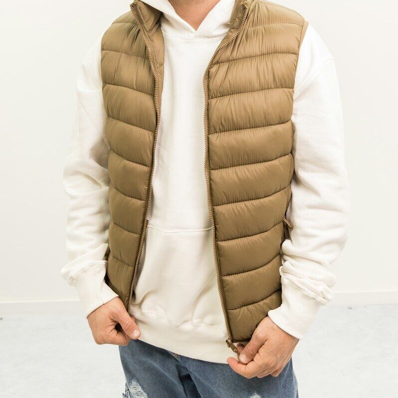 A man standing with his hands in his pockets